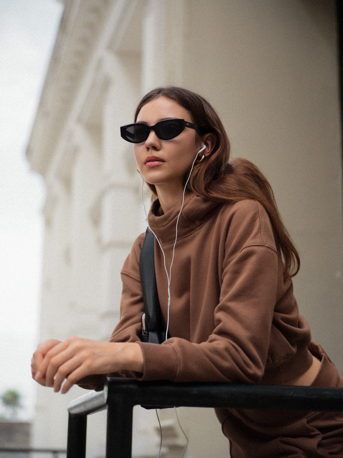 Model wearing the AEDIA Funnel Hoodie in Double Shot