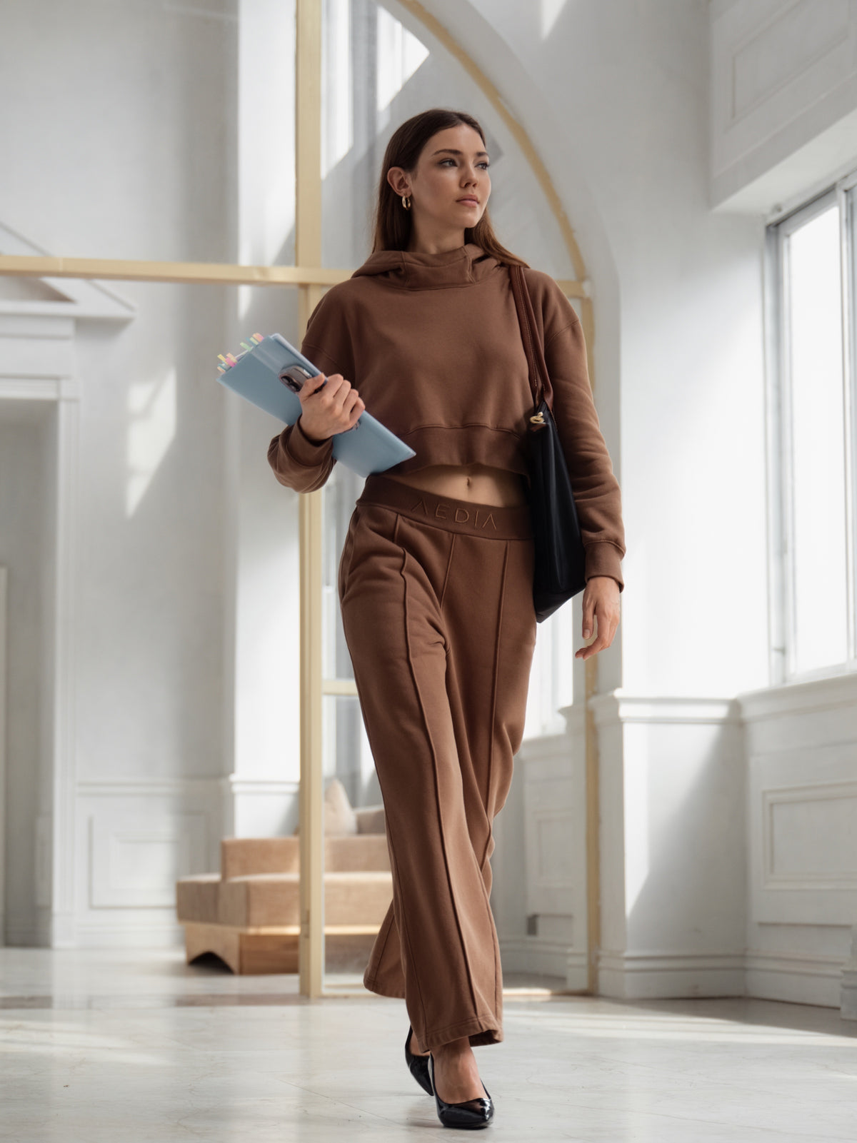 Model wearing the AEDIA Wide Leg Pants in Double Shot
