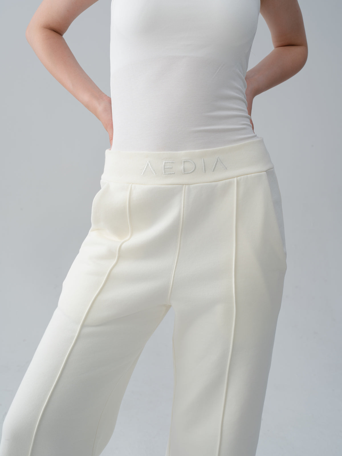 Waistband detail of the AEDIA Wide Leg Pants in Milk